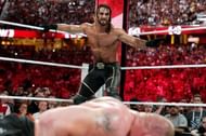 Rollins preys on a fallen Brock Lesnar